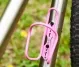 Wolf Tooth Morse Bottle Cage – Titanium Ceramic Pink Limited Edition