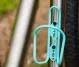 Wolf Tooth Morse Bottle Cage – Titanium Ceramic Turquoise Limited Edition